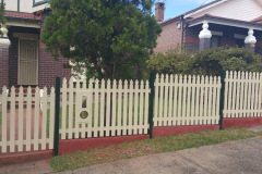 Aluminium picket fence and letterbox