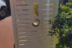 Aluminium slats fence panel with letterbox insert